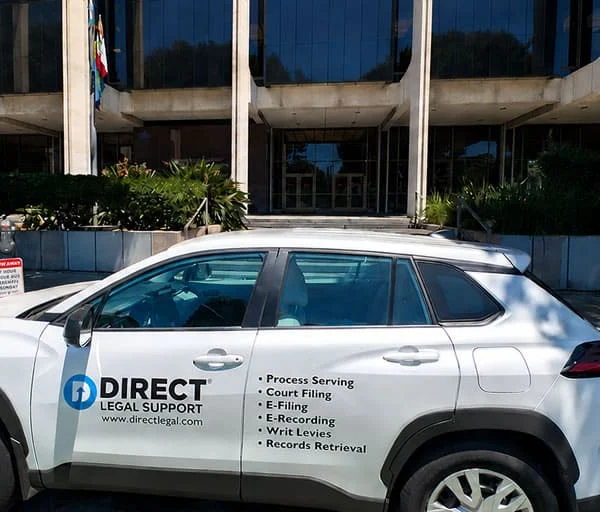 Direct Legal Support vehicle parked at the Beverly Hills Courthouse on Burton Way